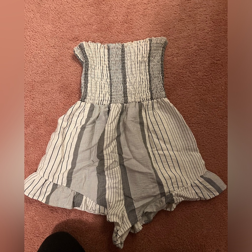 Smocked top romper with flowy bottom